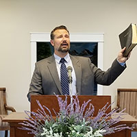 pastor behind pulpit